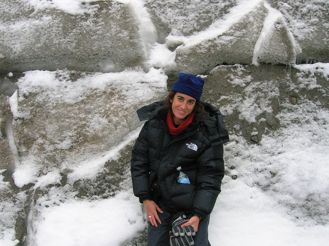 Kerri leaning against the glacier on the north face of Mt. Kailash.